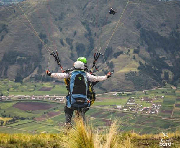 The adrenaline rush of the moment. Ready for takeoff with the instructor, with the Sacred Valley at your feet. Prepare for an unforgettable bird's-eye view of the Andean fields.