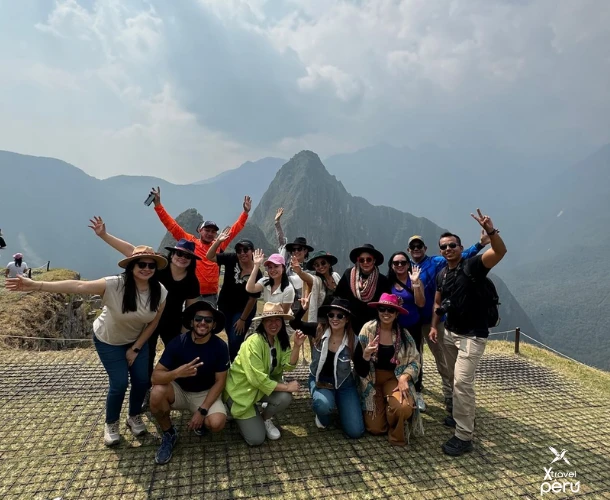 The group celebrating the success of a two-day adventure route that combines history and extreme nature. The perfect balance between the mystique of Machu Picchu and the Rainbow Mountain.