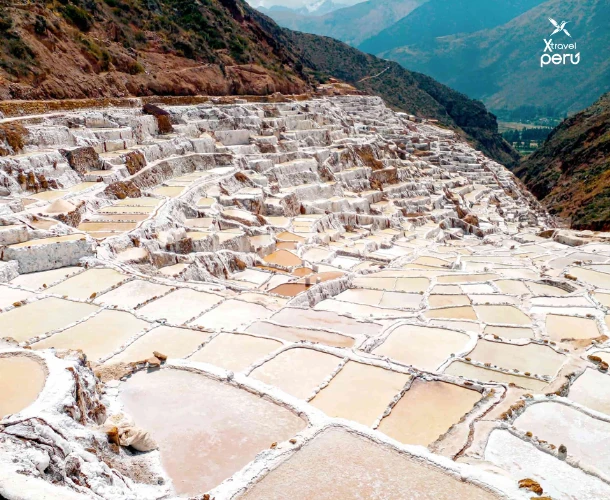 A stunning view of the Salt Mines, thousands of pools where salt is harvested artisanally. A unique white landscape in the Andean geography, harvested since ancient times.
