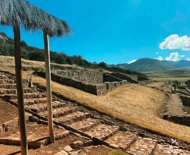 Full immersion in the Andean rural landscape. Observe the crop fields and terraces shaping the mountain. A view combining contemporary agriculture and the Inca legacy.