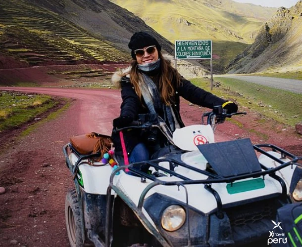 Personal victory at the mountain's base. The quad bike takes you to the starting point of the hike, maximizing your time. Ready to conquer the summit and the Red Valley.